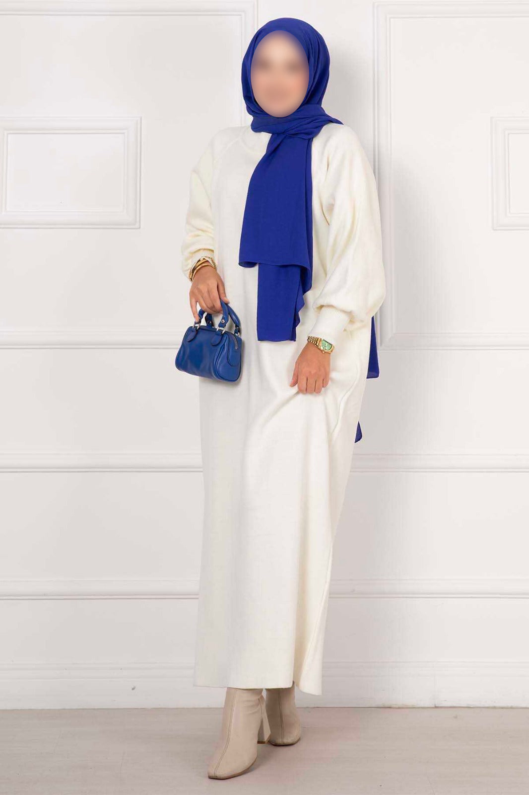 Vestido de punto color crudo con mangas abullonadas