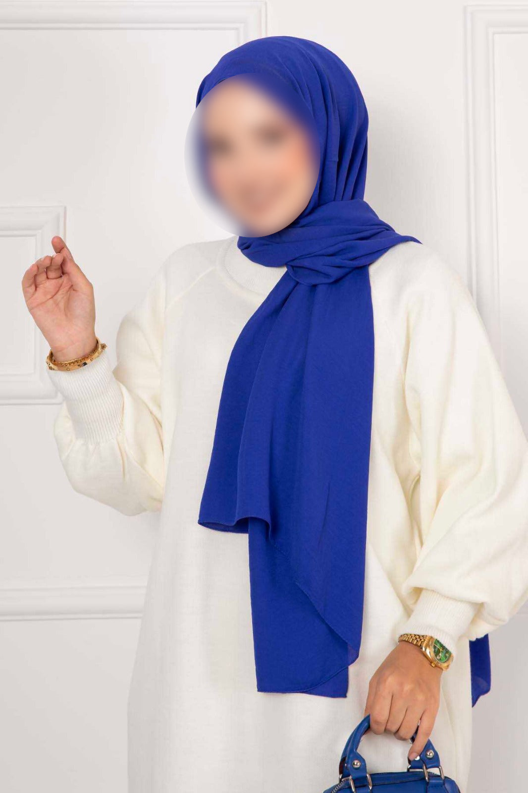 Vestido de punto color crudo con mangas abullonadas